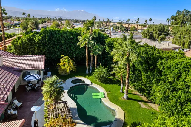 an aerial view of a swimming pool