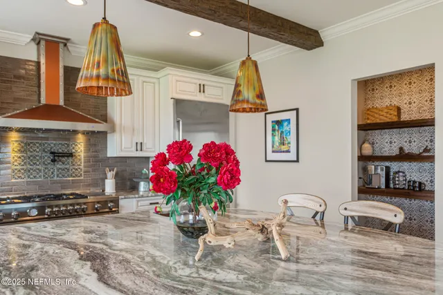 a view of a balcony with floor to ceiling windows
