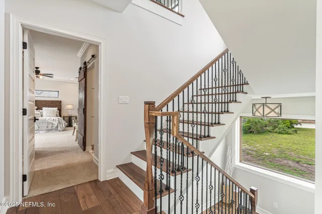 a view of a elevator with wooden door