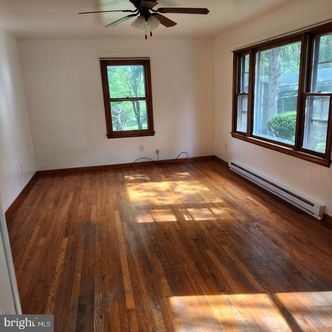 2445 Bear Wallow Hollow Road Augusta, WV 26704 - Photo 7 of 22 a view of an empty room with window