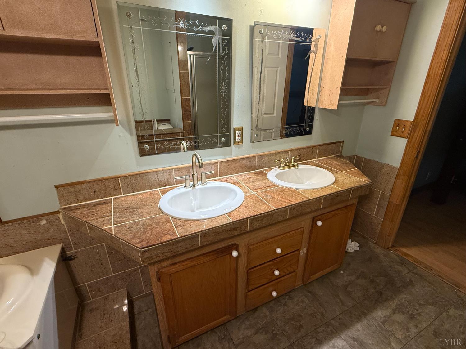 3974 Germantown Road Keysville, VA 23947 - Photo 11 of 42 a bathroom with a sink and a mirror