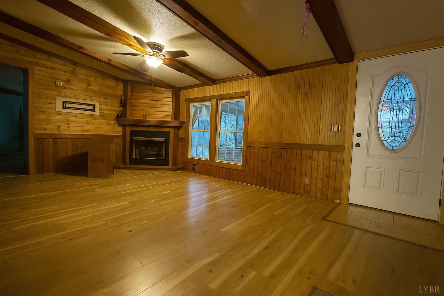 3974 Germantown Road Keysville, VA 23947 - Photo 17 of 42 a view of a livingroom with an empty space and a fireplace