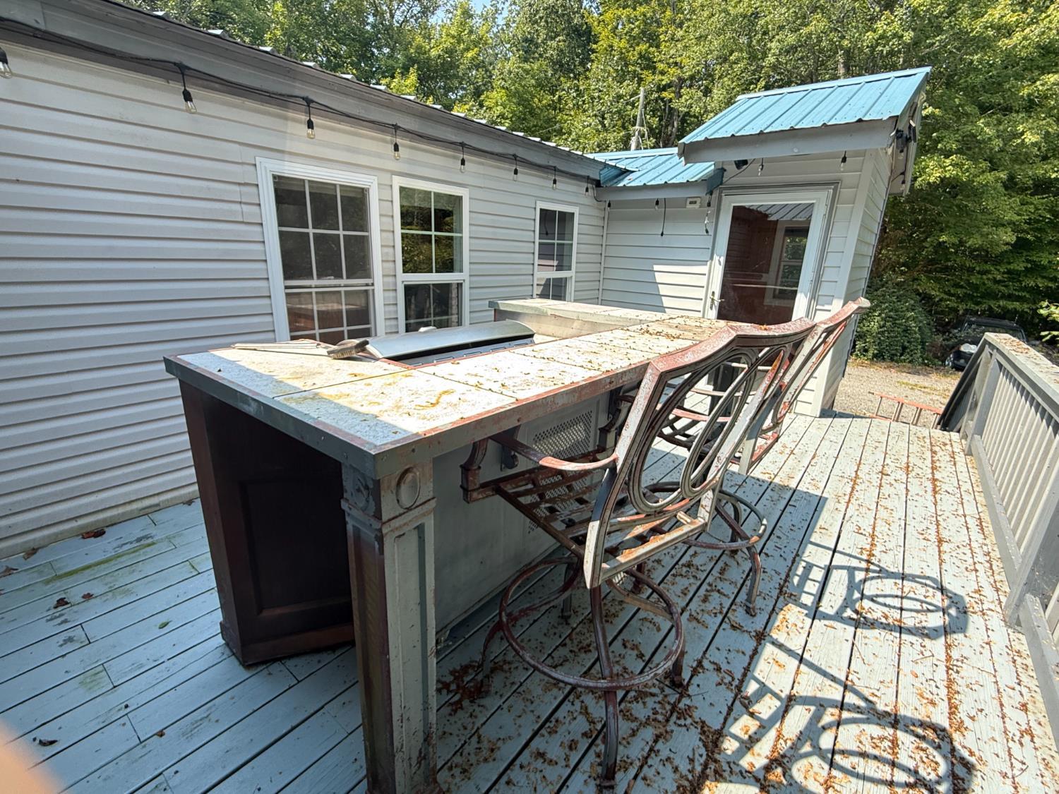 3974 Germantown Road Keysville, VA 23947 - Photo 30 of 42 a view of a wooden chairs on the deck