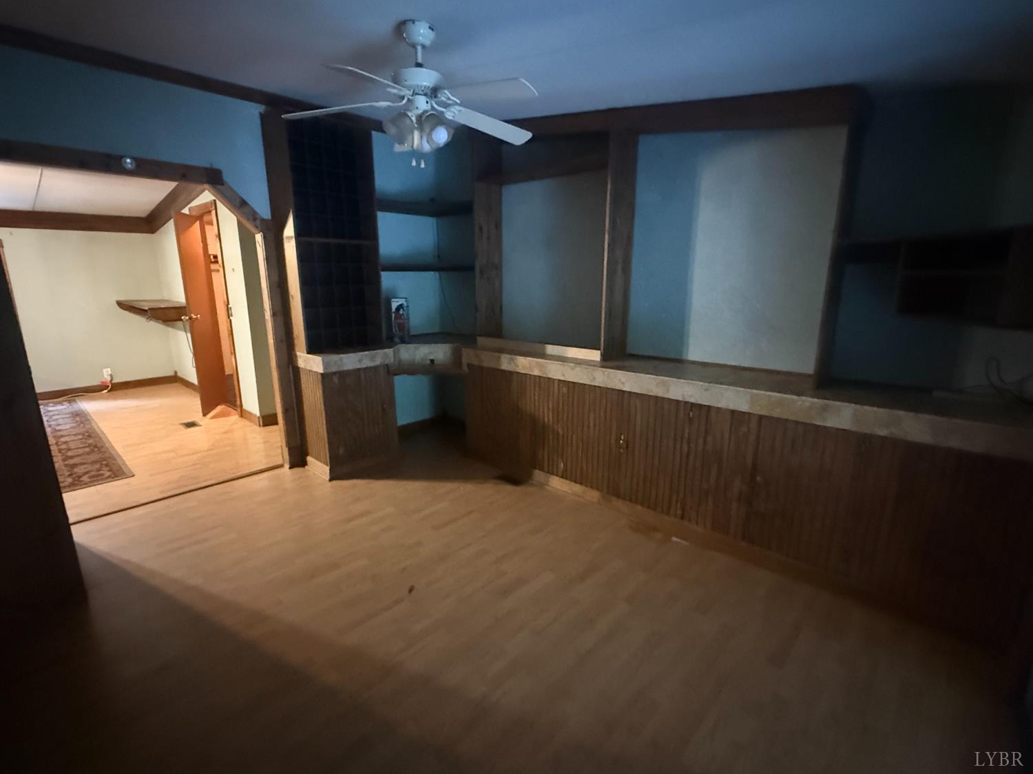 3974 Germantown Road Keysville, VA 23947 - Photo 6 of 42 a large room with a large window and chandelier