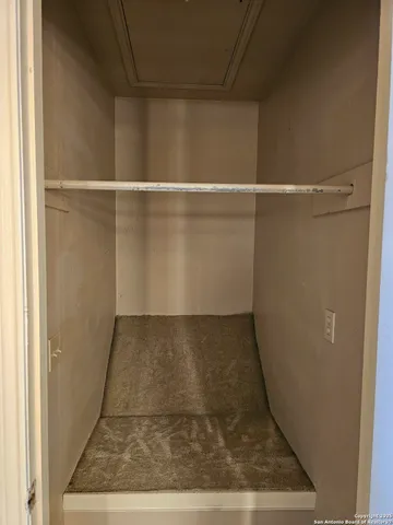 a view of a room with an empty space