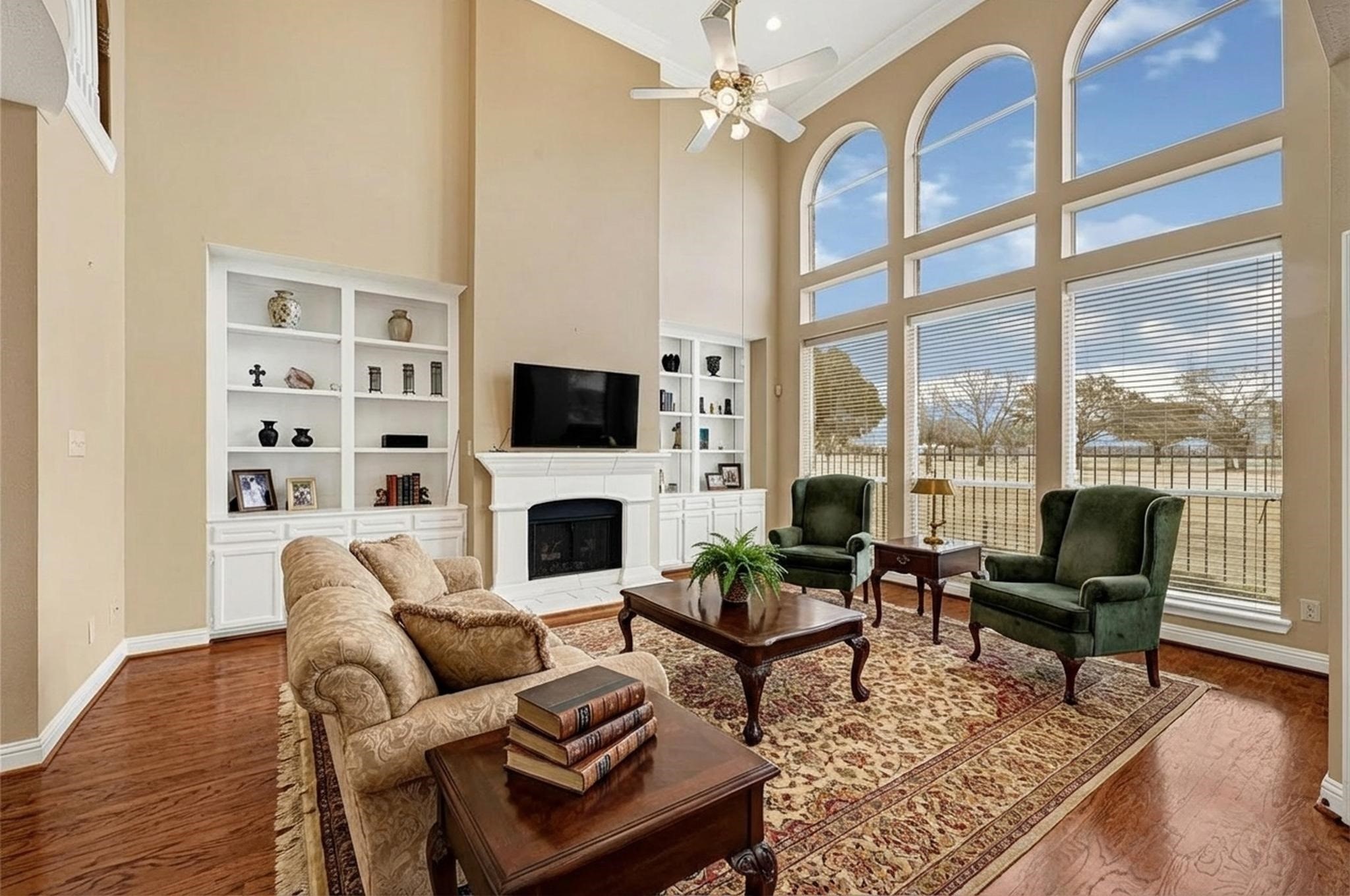 35 Parkway Place Houston, TX 77040 - Photo 18 of 37 a living room with furniture a rug and a flat screen tv