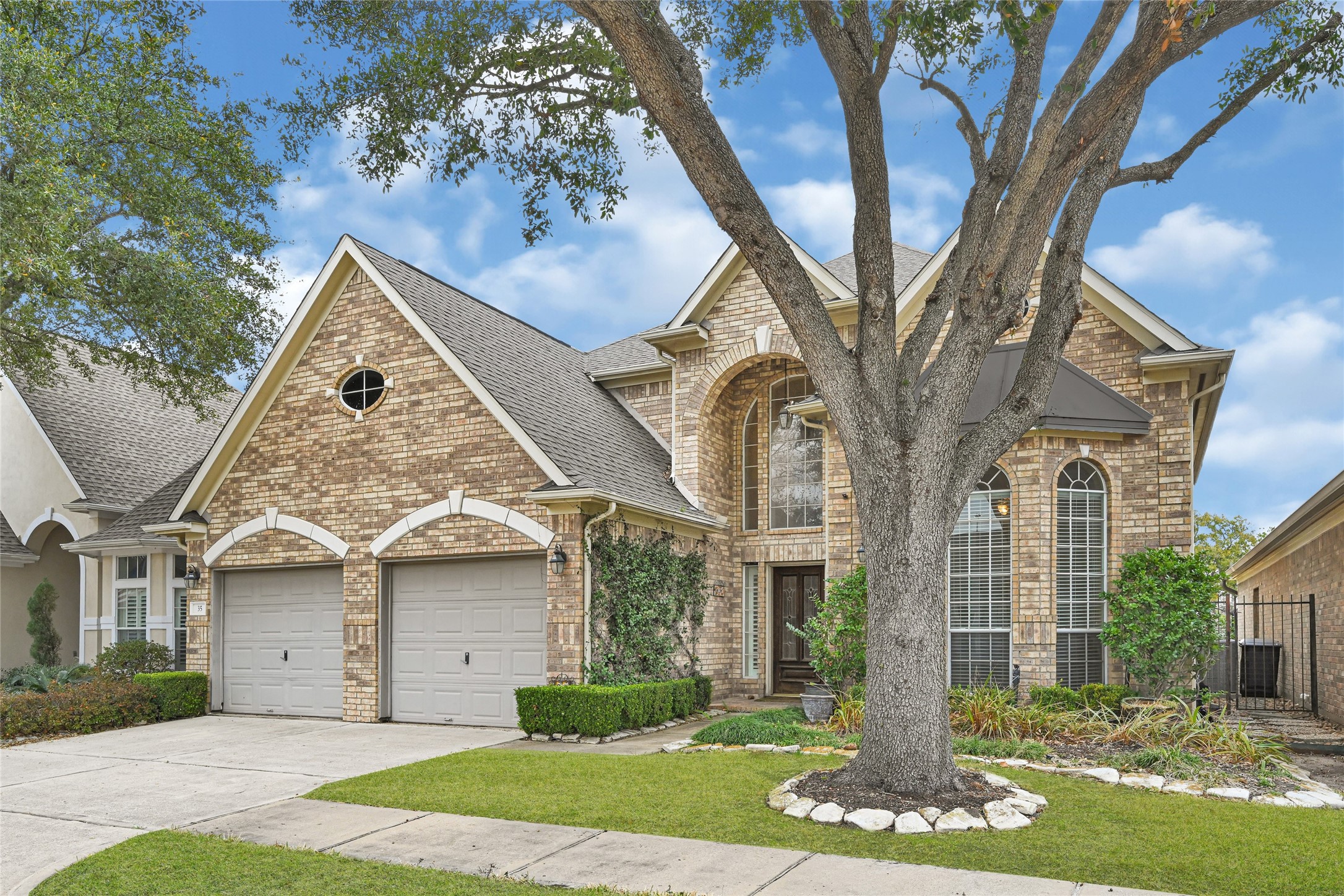 35 Parkway Place Houston, TX 77040 - Photo 2 of 37 a front view of a house with a yard