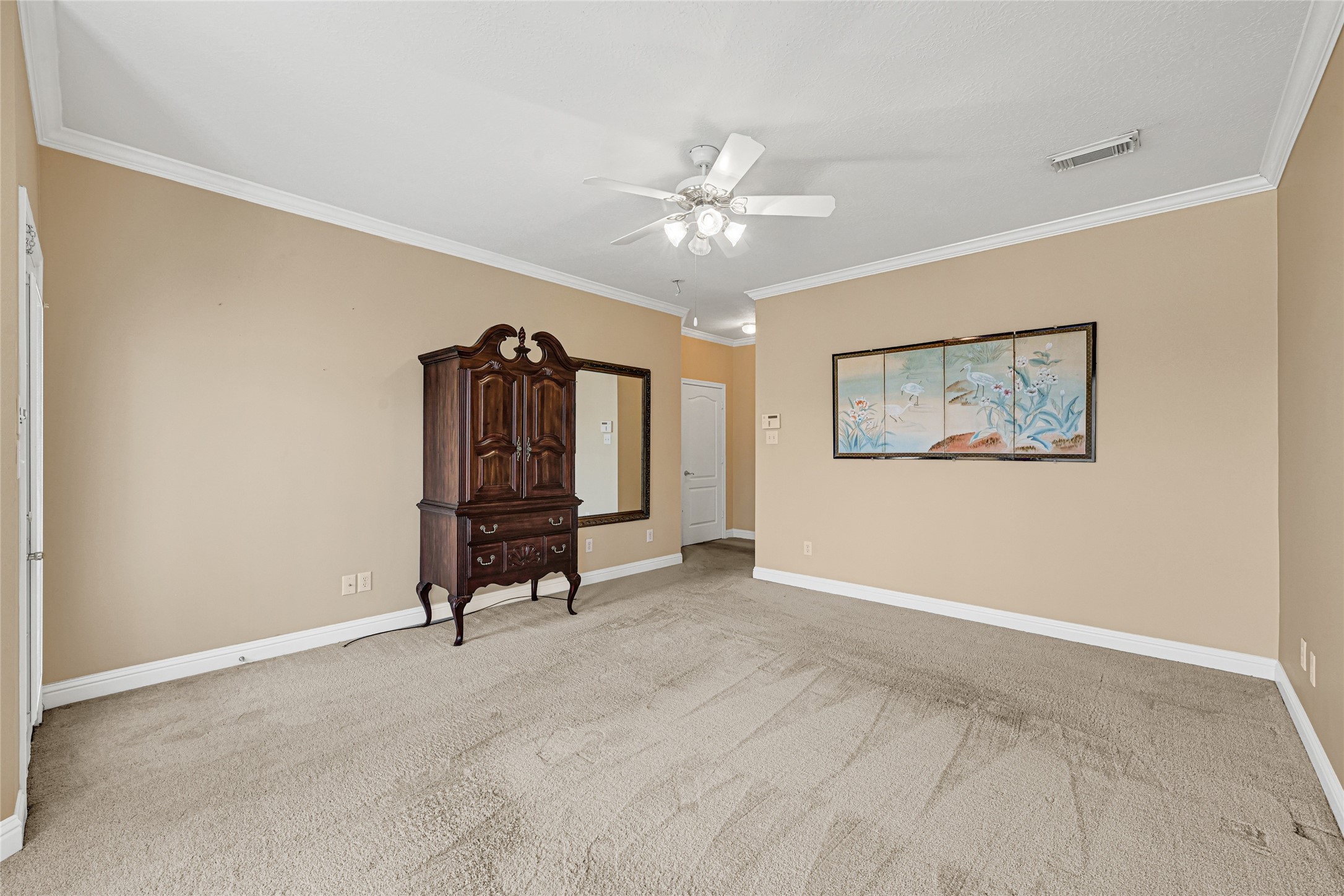 35 Parkway Place Houston, TX 77040 - Photo 22 of 37 a view of an empty room with a fan