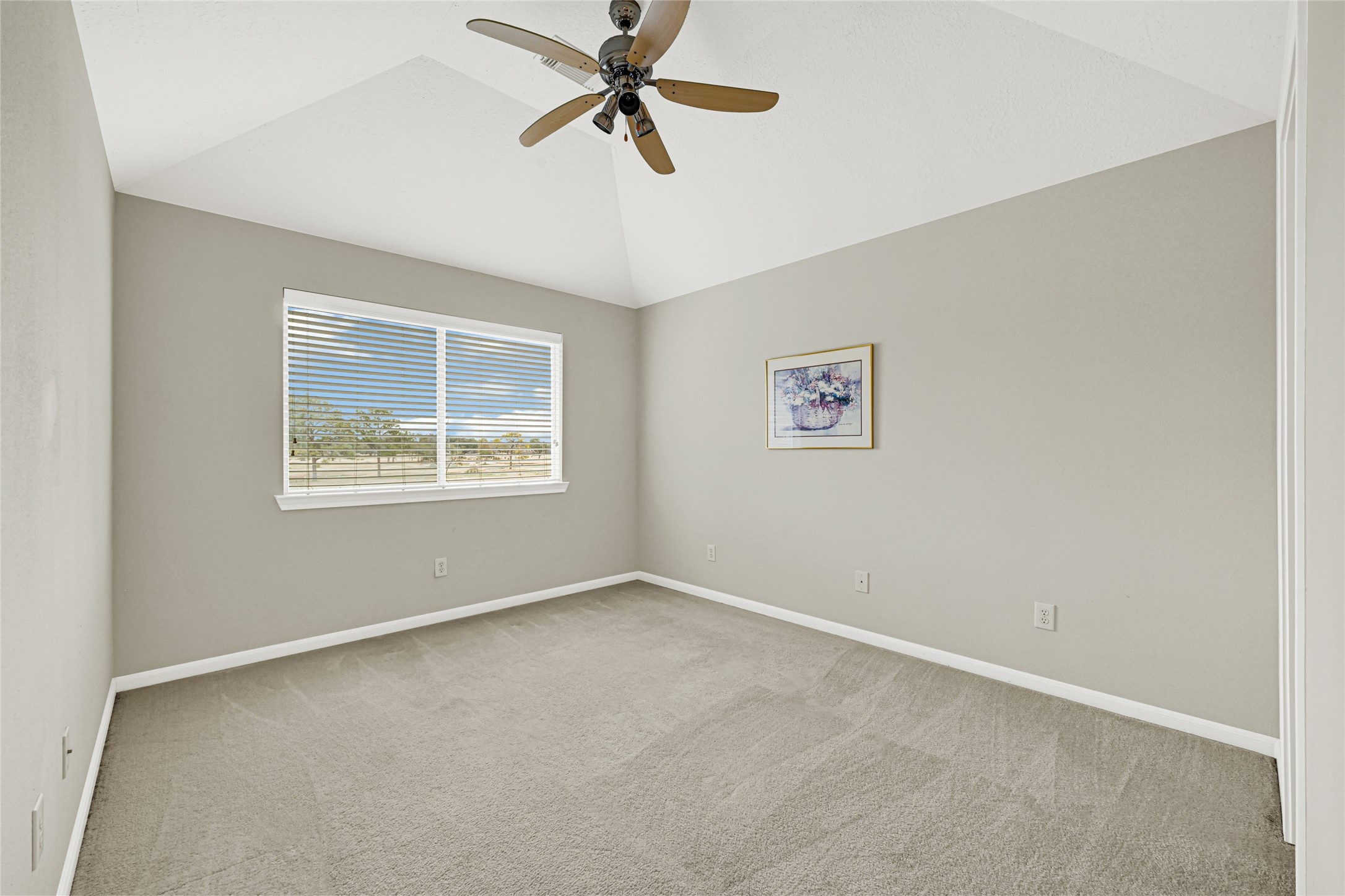 35 Parkway Place Houston, TX 77040 - Photo 32 of 37 an empty room with windows and fan