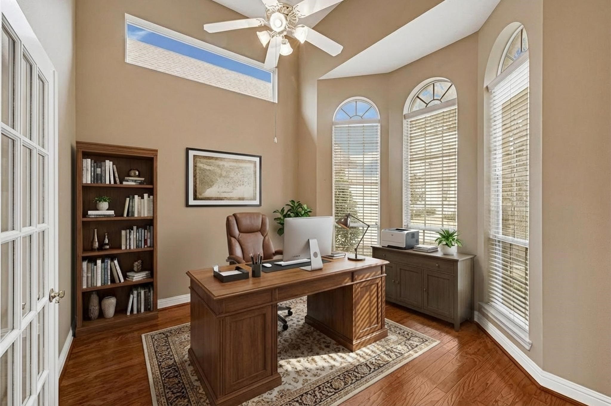 35 Parkway Place Houston, TX 77040 - Photo 5 of 37 a view of a workspace with furniture and a window