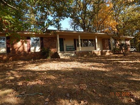 1116 Fall River Road Lawrenceburg, TN 38464 - Photo 1 of 16 a front view of a house with a yard