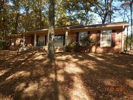 1116 Fall River Road Lawrenceburg, TN 38464 - Photo 2 of 16 a view of a house with yard and sitting area