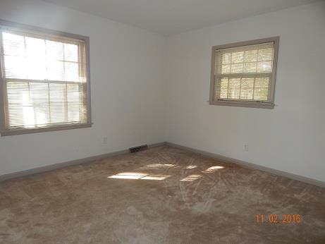 1116 Fall River Road Lawrenceburg, TN 38464 - Photo 11 of 16 an empty room with a window