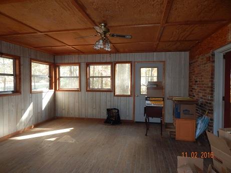 1116 Fall River Road Lawrenceburg, TN 38464 - Photo 7 of 16 a room with furniture and windows
