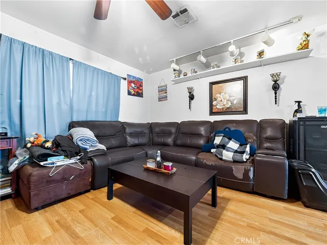 a kitchen with refrigerator and window