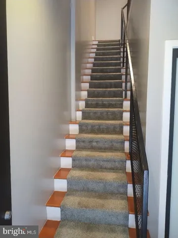 a view of entryway with a front door