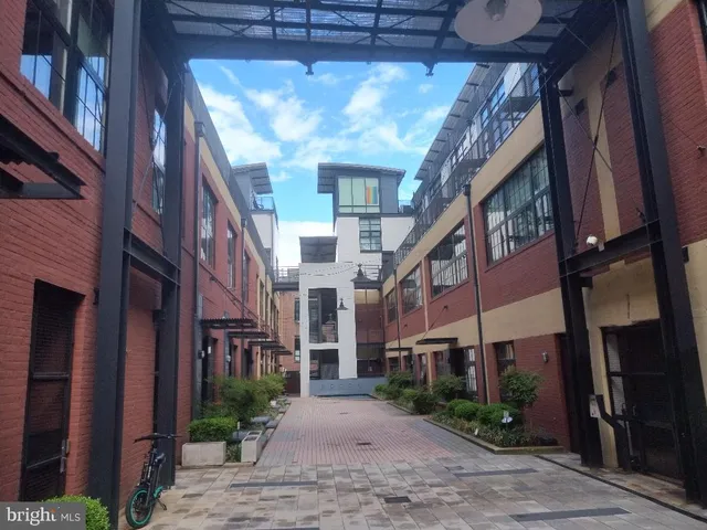 a view of a building with a street