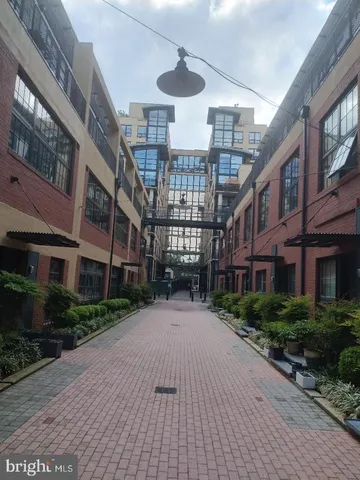 a view of a building with a street