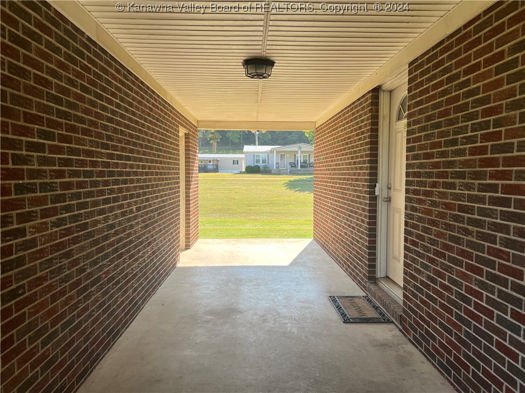 10583 Huntington Road Gallipolis Ferry, WV 25515 - Photo 4 of 34 BREEZEWAY TO GARAGE & KITCHEN DOOR