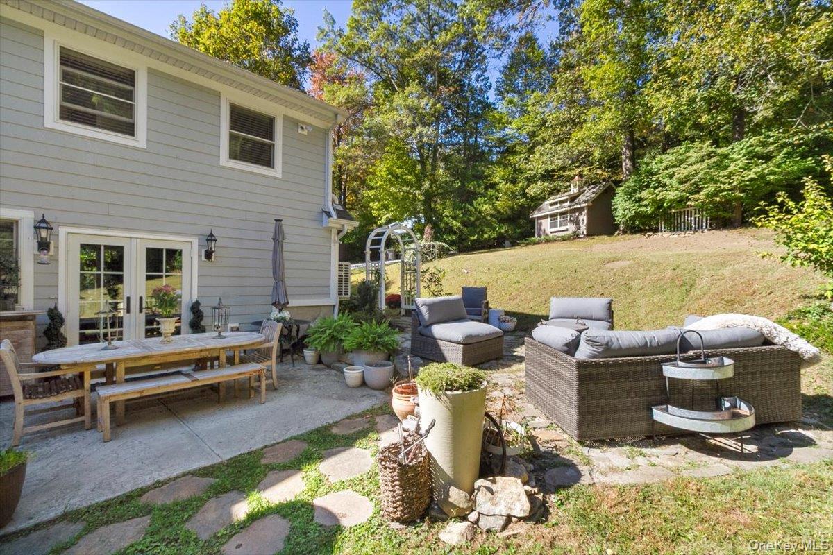 12 Philipse Road Carmel, NY 10512 - Photo 14 of 15 a view of backyard with seating area and trees around