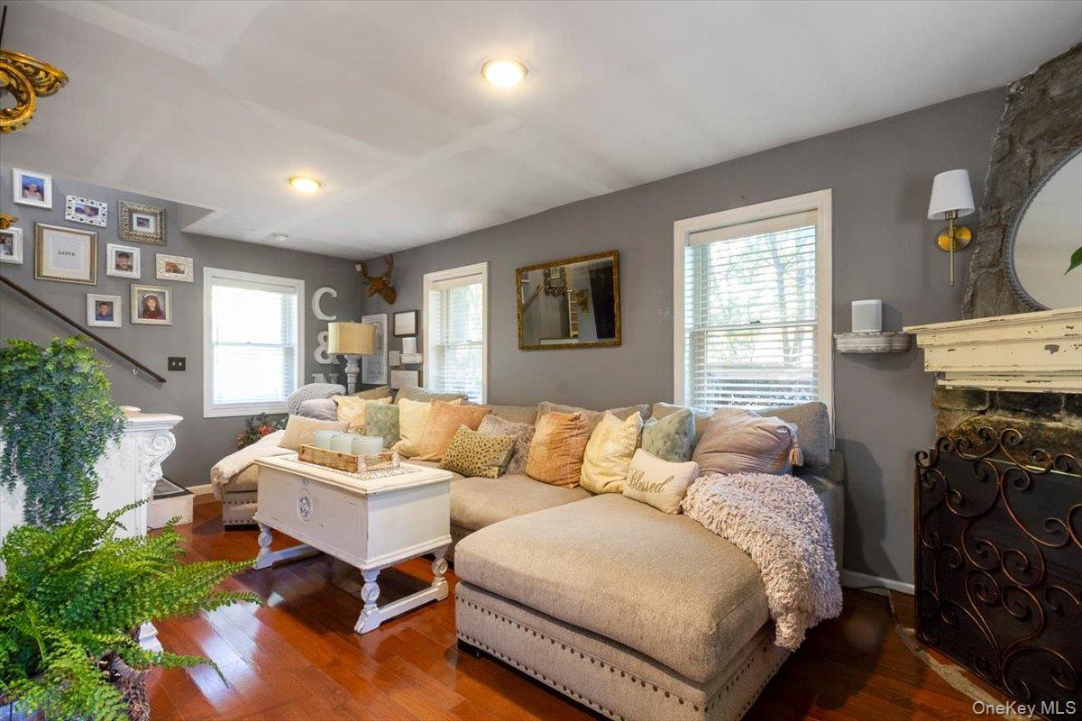 12 Philipse Road Carmel, NY 10512 - Photo 2 of 15 a living room with furniture and a fireplace