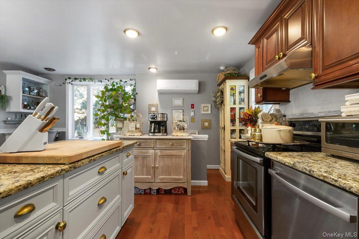 12 Philipse Road Carmel, NY 10512 - Photo 6 of 15 a kitchen with a sink stove and refrigerator