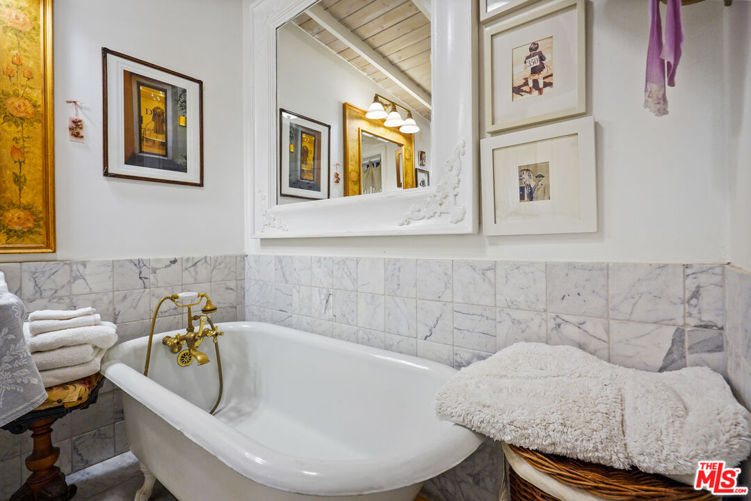 21658 Encina Road Topanga, CA 90290 - Photo 20 of 53 a bathroom with a sink and mirror