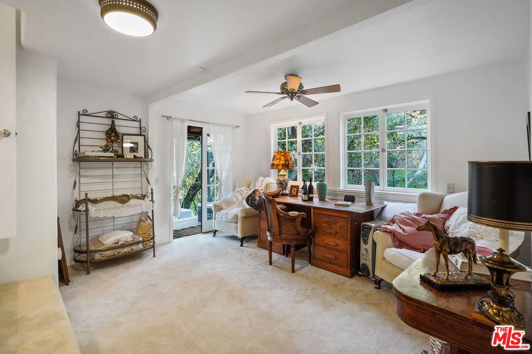 21658 Encina Road Topanga, CA 90290 - Photo 22 of 53 a view of a livingroom with workspace and a window