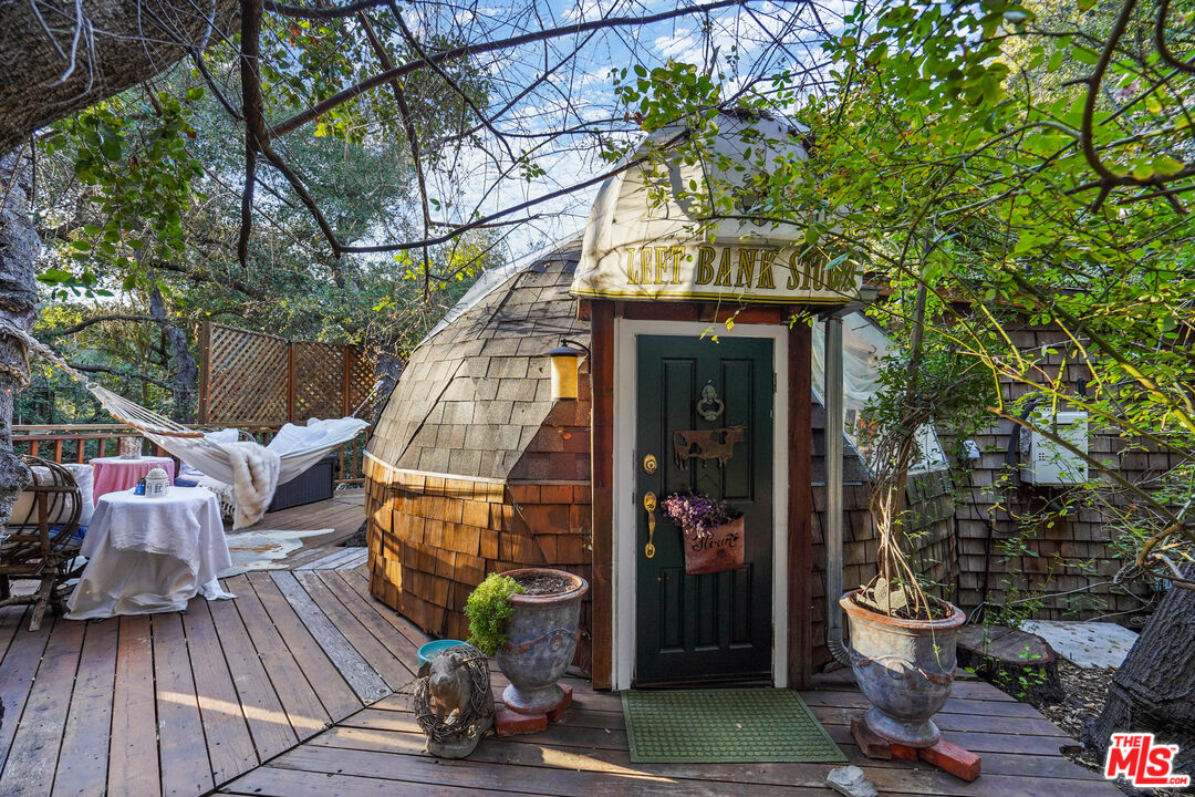 21658 Encina Road Topanga, CA 90290 - Photo 38 of 53 a view of a two chairs in the patio