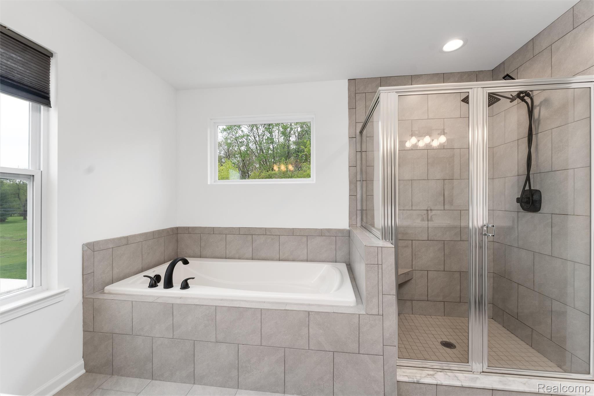 908 South Livernois Road Rochester, MI 48309 - Photo 27 of 49 Bathroom with a shower stall, a garden tub, and recessed lighting