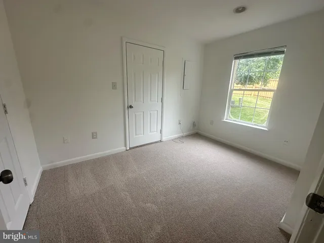 a bathroom with a toilet and a sink