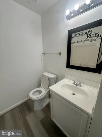 a kitchen with stainless steel appliances granite countertop a sink a stove and a microwave oven