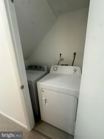 a bathroom with a sink a mirror and a bathtub