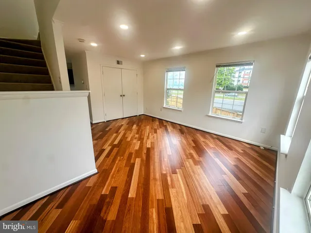 a bathroom with a sink a toilet and tub