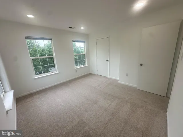 a view of a cars parked in front of a building
