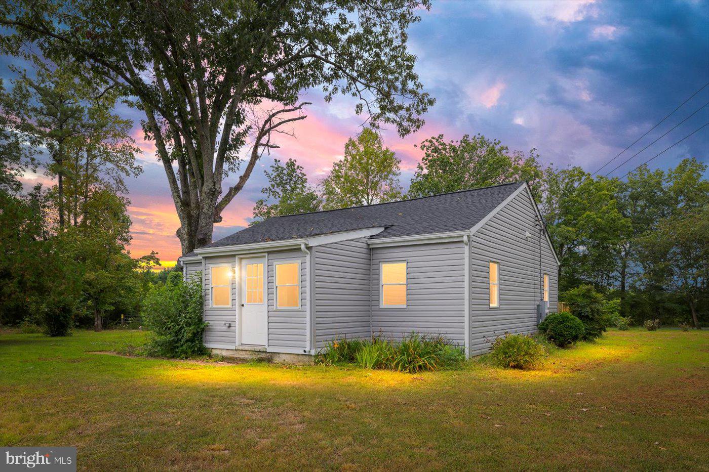 17287 Oakshade Road Orange, VA 22960 - Photo 1 of 26 a view of a house with a yard