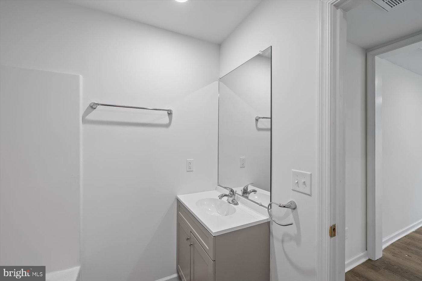 17287 Oakshade Road Orange, VA 22960 - Photo 11 of 26 a bathroom with a sink toilet and vanity
