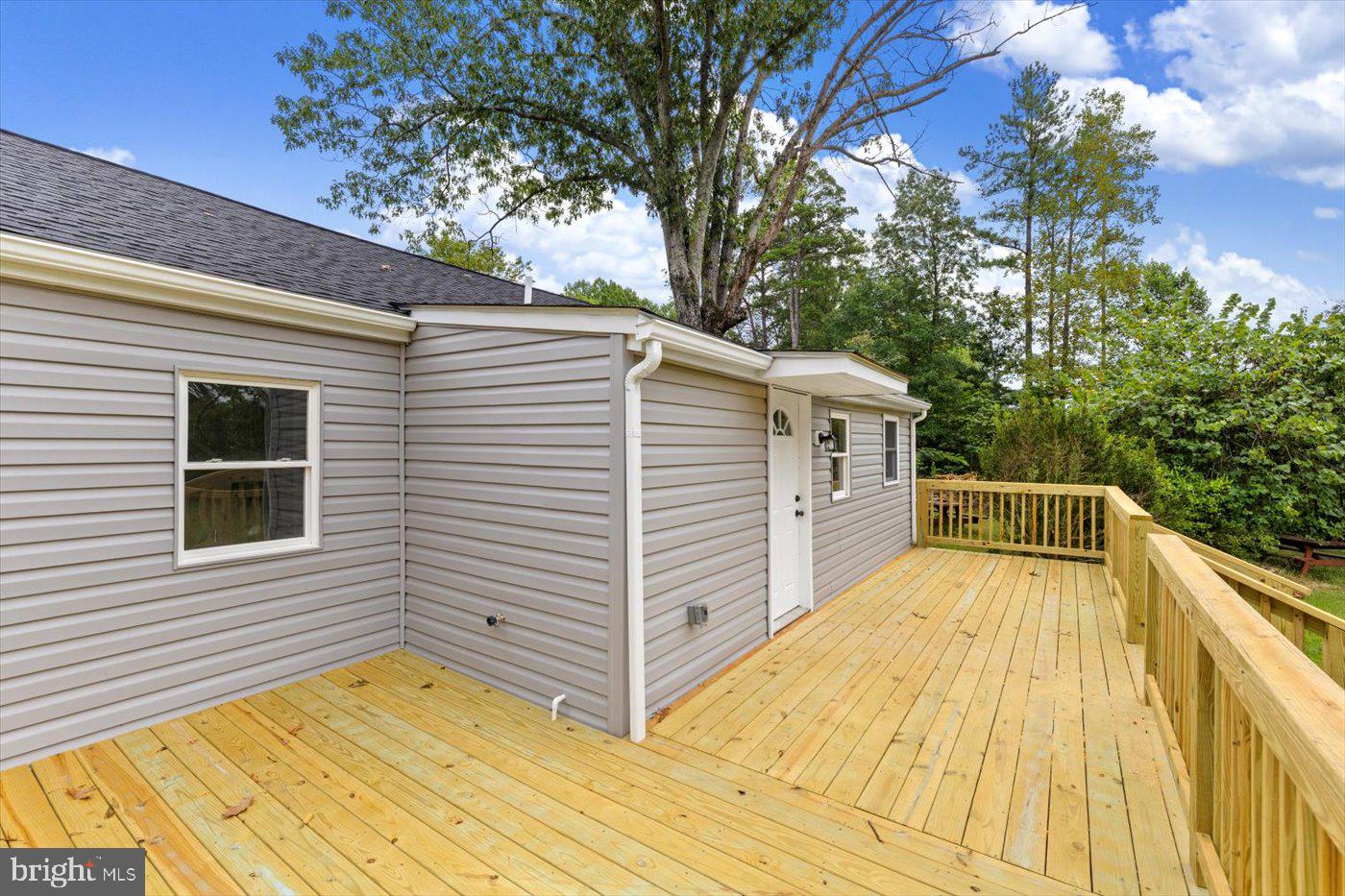17287 Oakshade Road Orange, VA 22960 - Photo 24 of 26 a view of house with backyard and wooden floor