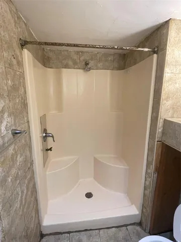 a view of balcony and yard