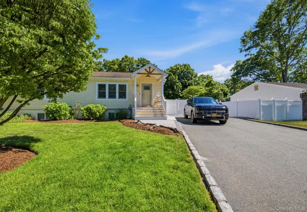 a house view with a garden space