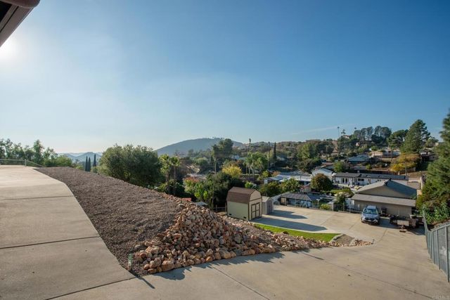 a building with swimming pool in front of it