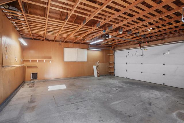 an aerial view of residential houses and city street