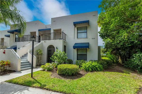 $306,000 | 3313 Europa Drive, Unit 216, Naples, FL 34105