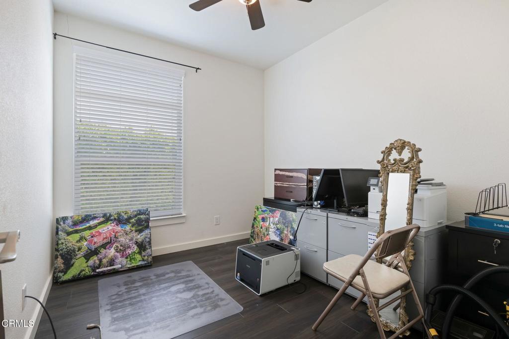11100 Telegraph Road, Unit 88 Ventura, CA 93004 - Photo 16 of 24 a living room with furniture and a flat screen tv