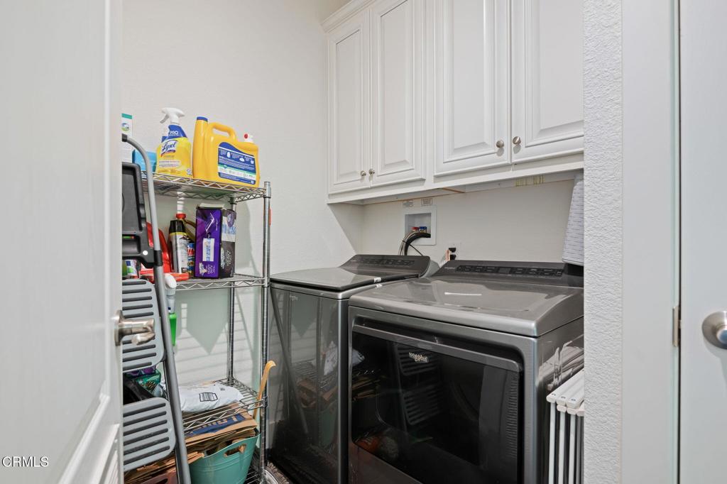 11100 Telegraph Road, Unit 88 Ventura, CA 93004 - Photo 17 of 24 a utility room with dryer and washer