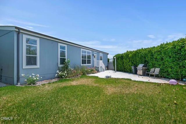 a house view with a garden space