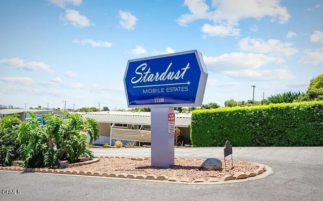 a sign on the side of the road