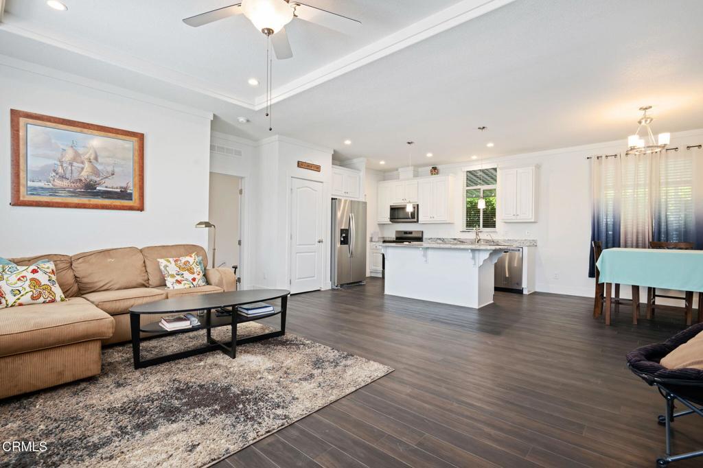 11100 Telegraph Road, Unit 88 Ventura, CA 93004 - Photo 5 of 24 a living room with furniture and kitchen view