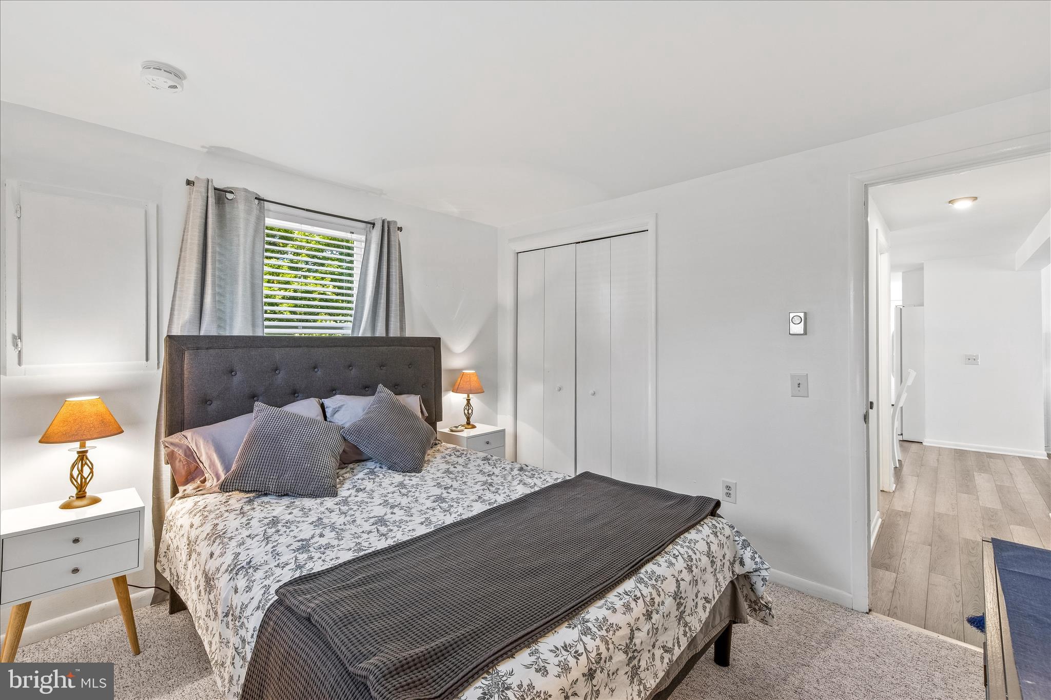 21406 Dogwood Cove Road Tilghman, MD 21671 - Photo 33 of 68 a bedroom with a bed and a window