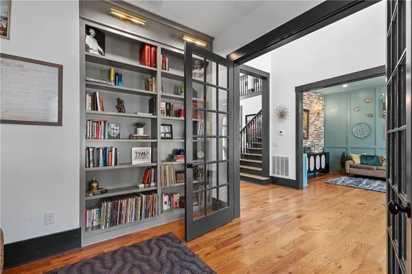 a living room with furniture and a rug